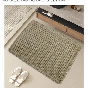 Elegant Brown Bathroom Rug with Tassels